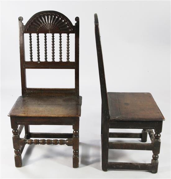 A pair of late 17th century oak North Cheshire / South Lancashire backstools,